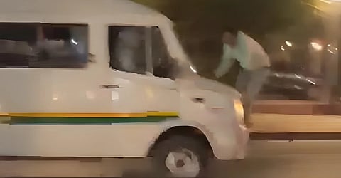 Man dragged on a minibus’ bonnet in road rage incident in Delhi; watch 