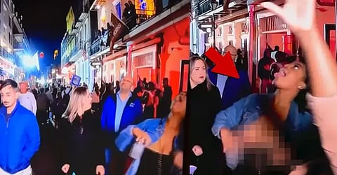 ESPN Woman Video: Female Fan strips during live broadcast of the Sugar Bowl, Channel apologises