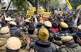 MinisterHarjot Bains injured in AAP's paddy protest as police use water cannons