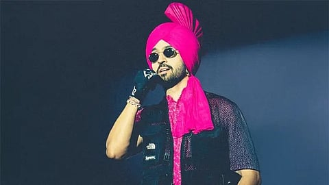Diljit Dosanjh notices fans watching Ahmedabad show from hotel balcony without tickets, pauses show