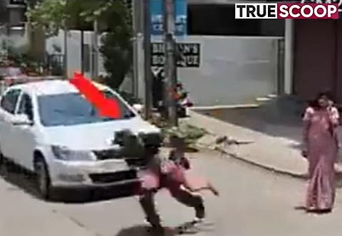 Watch: Army Personnel saves little girl's life from a fast-moving car, breaks woman's phone for ignoring the child