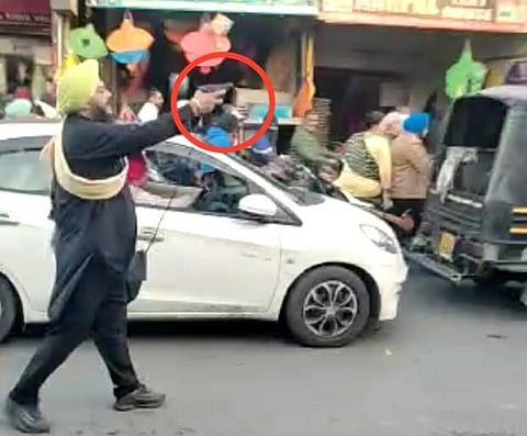 Amritsar: Stuck in traffic, a man steps up to control the busy market’s traffic with a pistol; Video Viral