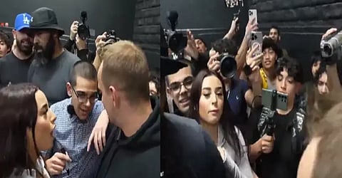 Neon's girlfriend spits on YouTuber Vitaly's face after he shows