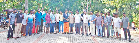 People Gathered in frount of Mobile Tower