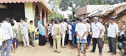 Beneficiaries standing outside the Ration shop in Chalamatti village, Kalghatgi taluk.