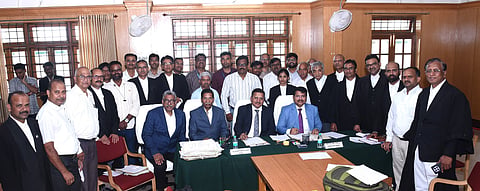 National Lok Adalat at the Dharwad Bench of the High Court.