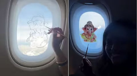 Ganesha in the airplane window
