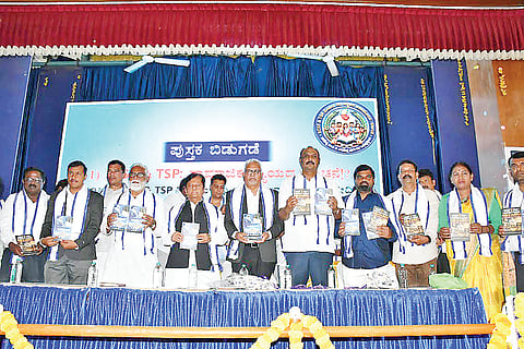 Dignitaries released the book 'Janaghosha' at a program organized on Sunday at the Centenary Hall of Maharaja College in the city. N. Mahesh, Kote M. Shivanna, and Ashwin Kumar were among those present.