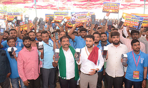 
Meter readers protested by displaying the meters of ESCOMs during the indefinite strike organized by the KPTCL Outsourced Employees' Welfare Forum to press for various demands.