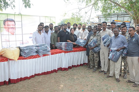 Raincoats were distributed to the mausoleums and kavadis as part of Dr. M.B. Patil's birthday.