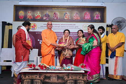Sri Veereshananda Saraswati Swamiji, Dr. S. Ahalya Sharma, Dr. Y. A. Ajith Niranjana, and others participated in the launch ceremony of the book *Tarpana Vidhi Viveka*, published by Anantharama Prakashana.