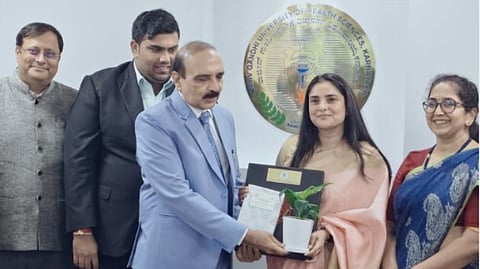 Dr. Bhagavan B.C. and Ramya at the RGUHS meeting.