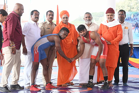 Sri Gavisiddeshwara Swamiji inaugurated the wrestling match on Tuesday. Sri Shivashantaveera Swamiji, Wrestler Srinivasagowda, L. Nagesh, and others were present.