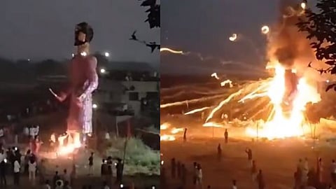 During the burning of the Ravana effigy on Dussehra, firework rockets shoot out from the effigy towards the crowd, while spectators run to escape.