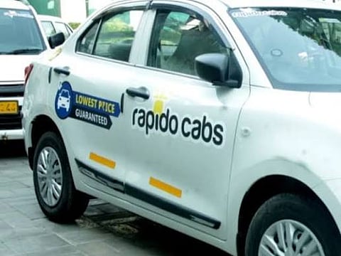 Rapido cab driver demands money to return a mobile phone left behind in the cab to the customer.