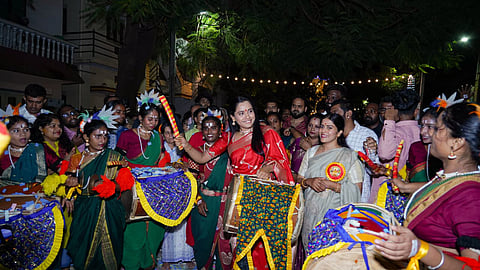 At the Dasara festival held in Mattikere, KPCC spokesperson H. Kusuma flagged off the procession by playing the 'Dollu' (a traditional drum).