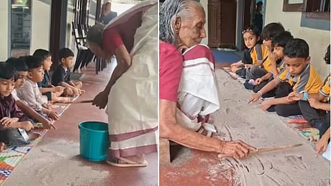 grandmother teaching letters on the sand