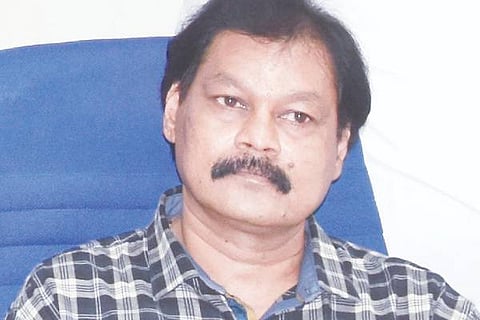 Dr. PALAKSHA