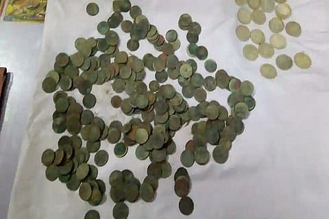 silver and bronze coins up