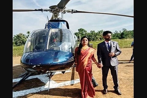 Bride arrives by helicopter in Wayanad