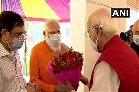modi greets advani