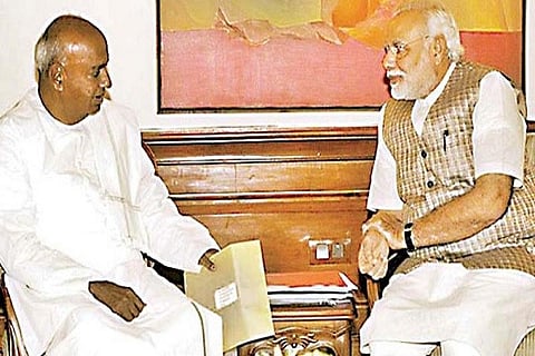 HDD and Modi File Photo