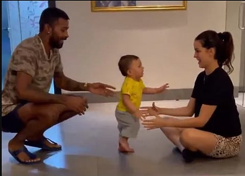 pandya and his wife and son for web