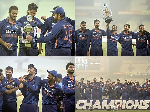 indian team with trophy for web