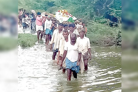 Haralu Villagers Carrying dead body throw pit