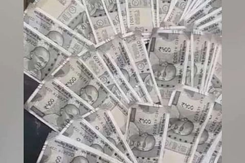 Boy snatches money garland off groom’s neck