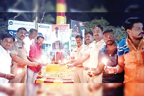 150223 Gangavati Solders Silent Prayer