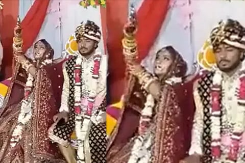 Bride seen firing a gun while sitting with groom in viral video