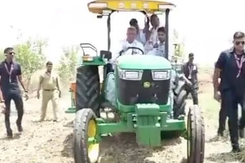 Chhattisgarh CM Baghel rides tractor sows seeds on Akti Tihar