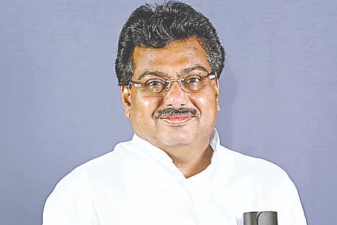 M B Patil