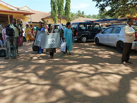 Poling Staff going to center with voting metrial