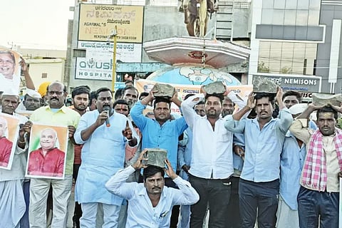 Protest with stone on head