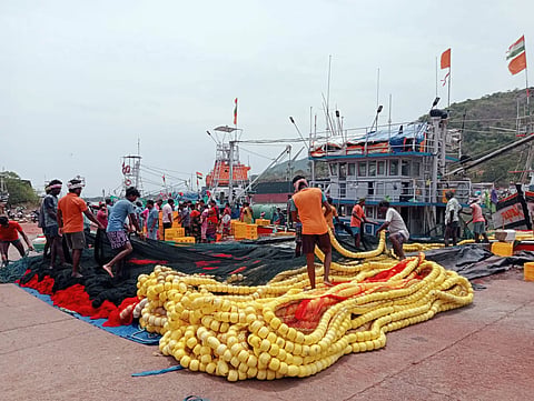 boats-are-shore-Fisharmens-working-with-nets.