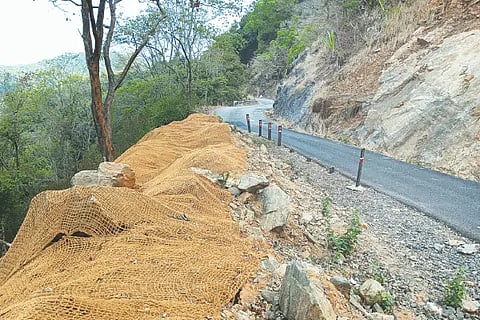 A coconut fiber net has been installed on the fallen hill in Anashi Ghat