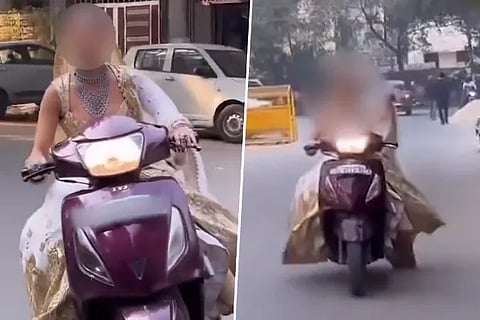 Bride rides a scooter without helmet in viral video Delhi Police reacts