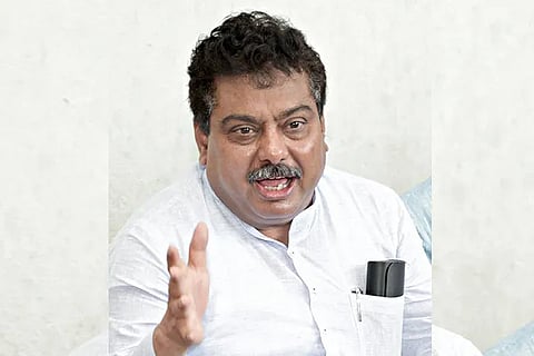 M B Patil