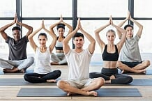 depositphotos_390325452-stock-photo-young-people-practicing-yoga-in.jpg