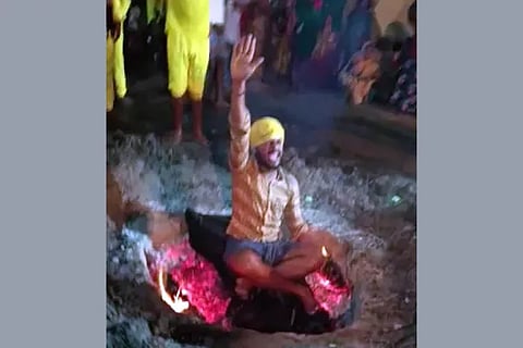 Bhupa sitting on a blanket in Kenda!