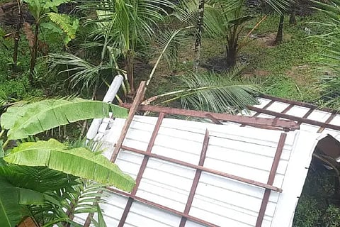 The roof of Sridhara Beerappa Ambiga's house in Molkoda of Honnavar taluk was blown away by the wind.