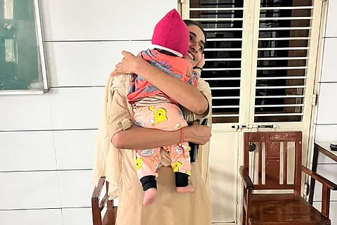 Woman constable takes care of infant while mother writes exam in Ahmedabad