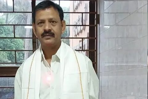 Negligence of railway staff mechanic fell into train engine fan and crushed
