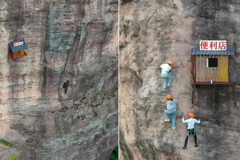 This Tiny Store Hangs From A Large Cliff in China