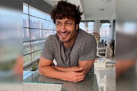 Vidyut Jammwals trick to sexy neck is balancing 30 kg on forehead
