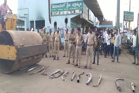 Defective silencer destroyed by road roller