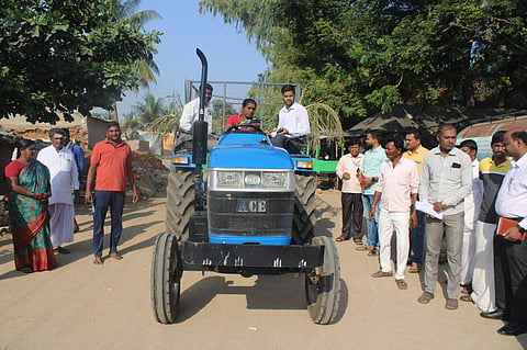 zp ceo drives tractor koppal visit gp