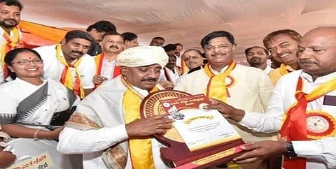 Kannada rajyotsava award withdrawn mysore district administration